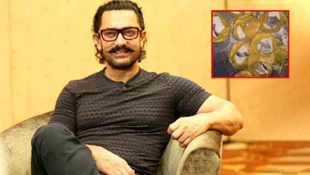 Dünyaca ünlü oyuncu Aamir Khan, 1 kg unun içine para gizleyerek vatandaşlara yardım etti